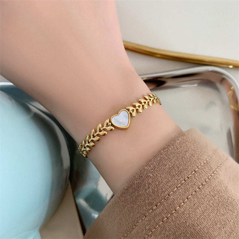 Exquisita pulsera de concha de nácar blanca en forma de corazón natural para mujer