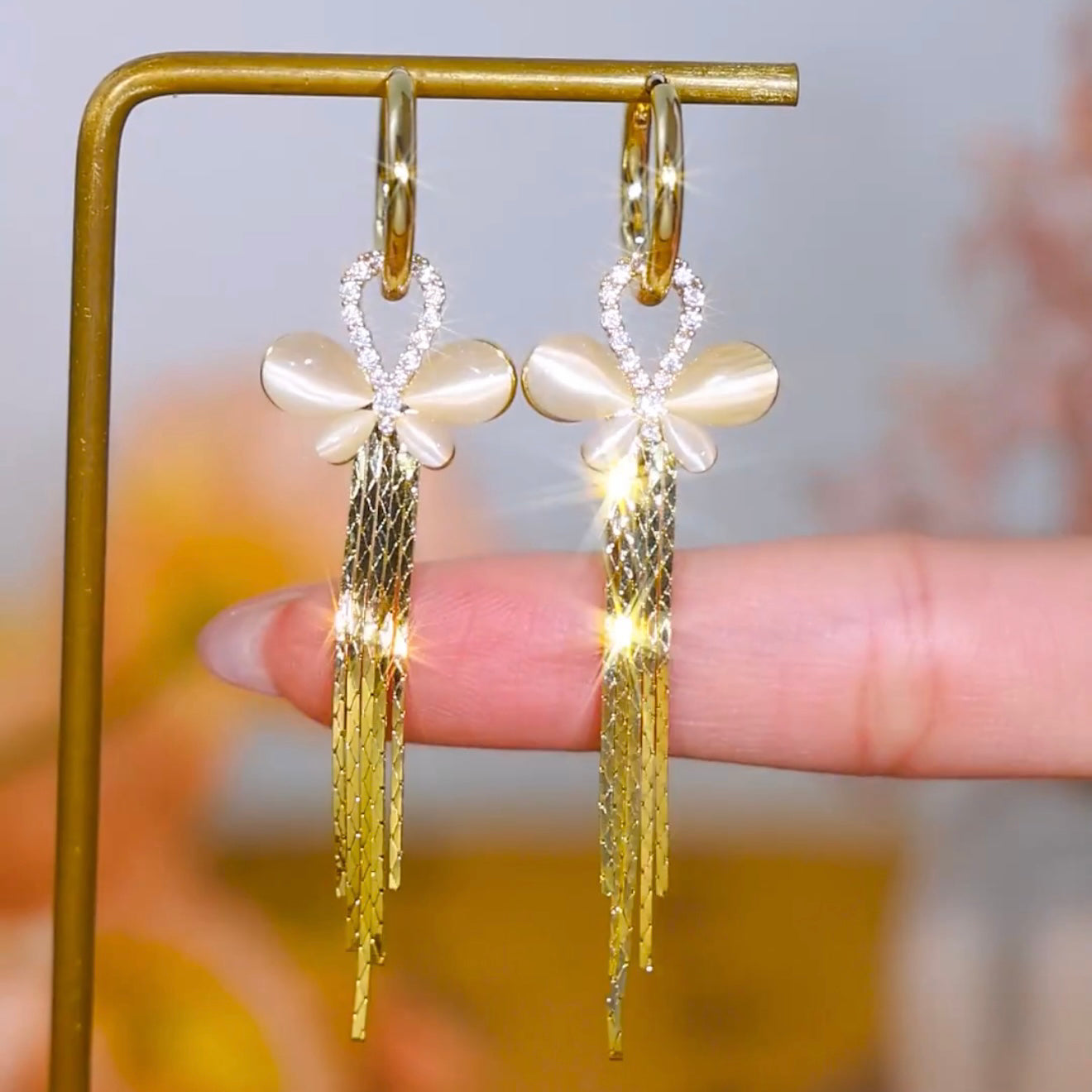 Design Simple Cat'S Eye Butterfly Tassel Long Earrings