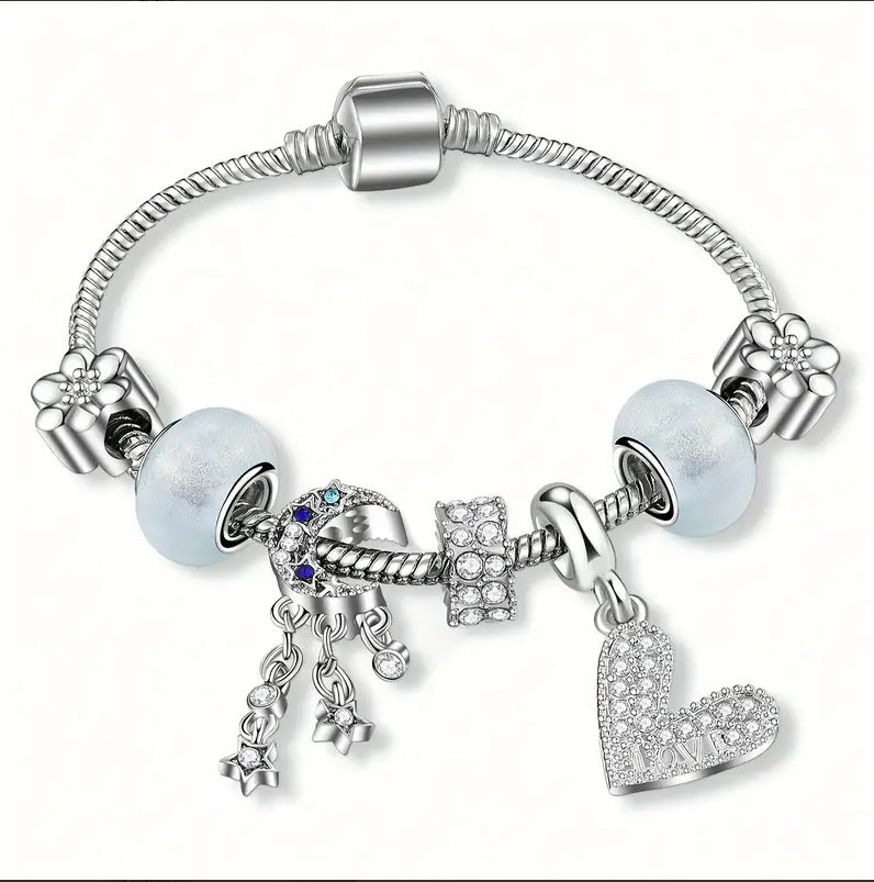 Pulsera de corazón con diamantes y cuentas de circonitas en forma de barril y copos de nieve dorados