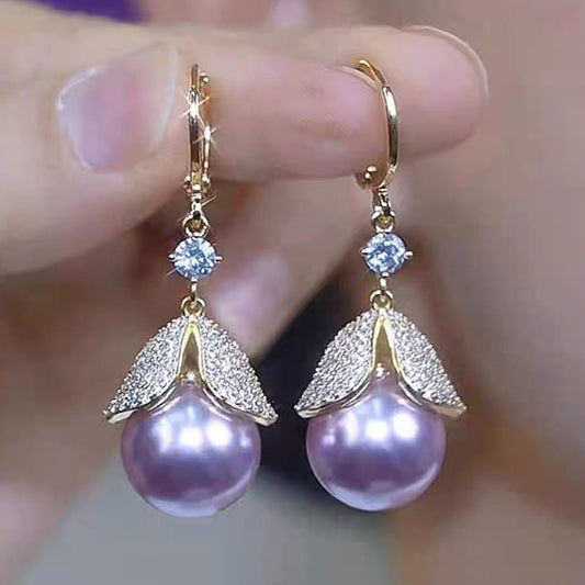 Elegantes pendientes de hojas de diamantes y perlas moradas