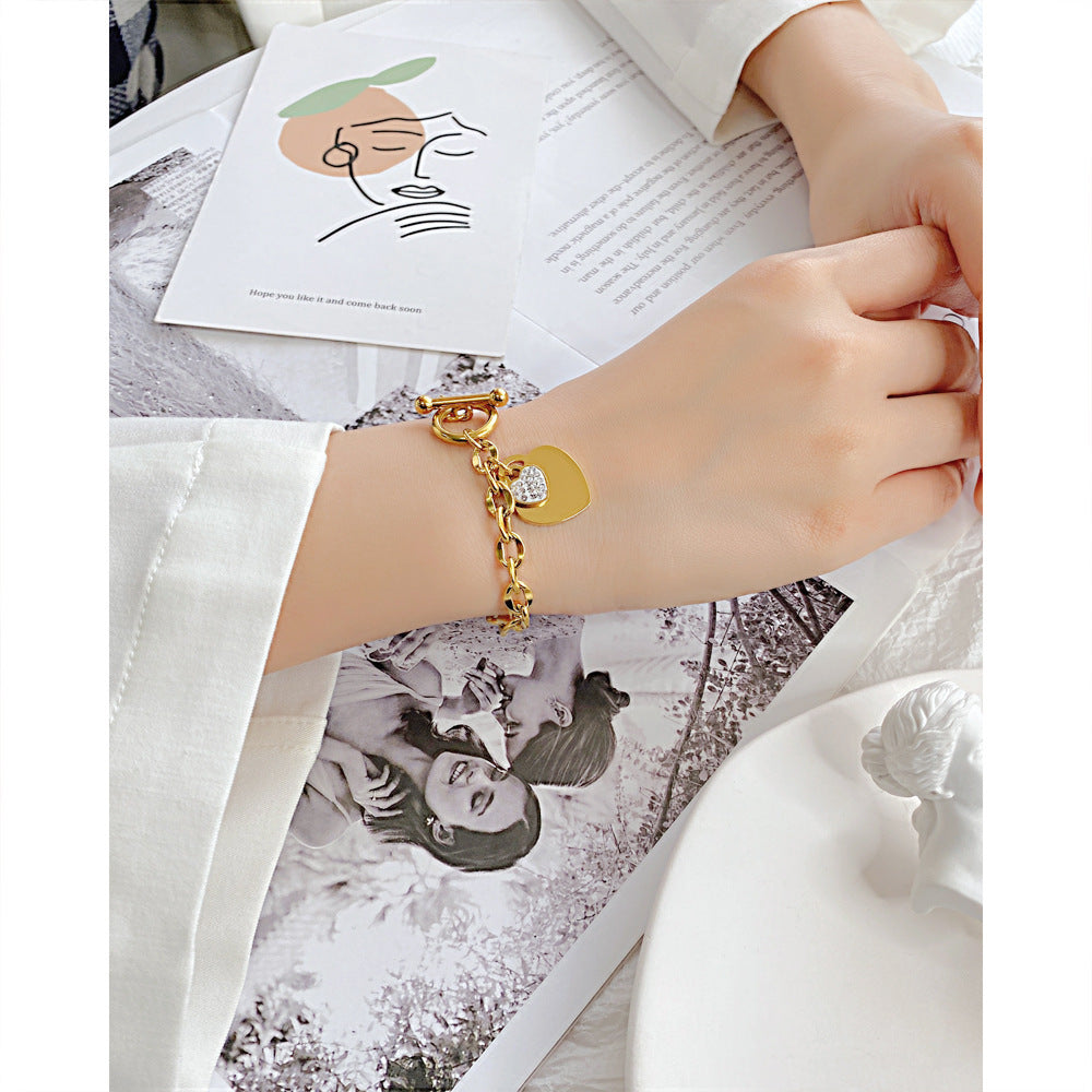 Pulsera de acero inoxidable con diseño de amor a la moda y acero de titanio para mujer