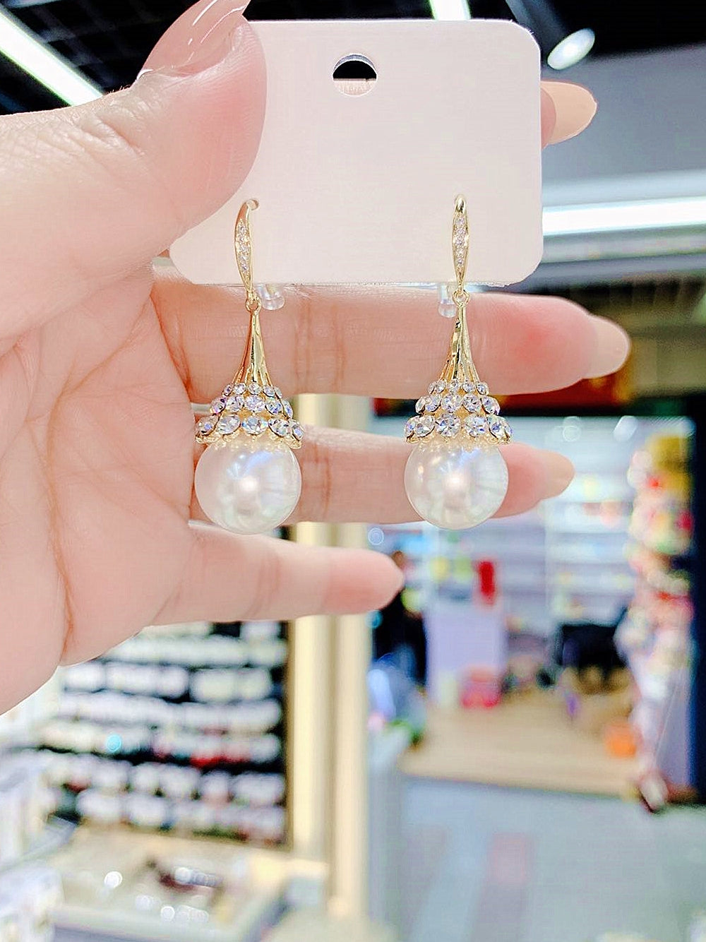 Pendientes de perlas de alta gama y pendientes elegantes