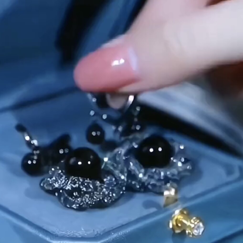 The Enchanting Black Flower Earrings Exude Sophistication