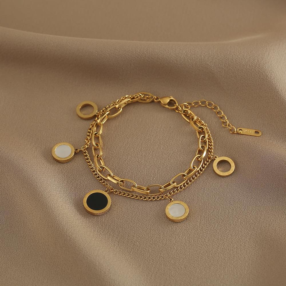 Pulsera de acero de titanio de doble capa con números romanos en blanco y negro para mujer