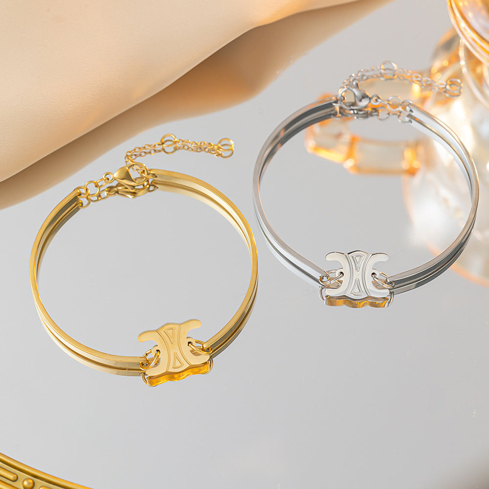 Pulsera de oro de alta gama con diseño de Arco del Triunfo para mujer