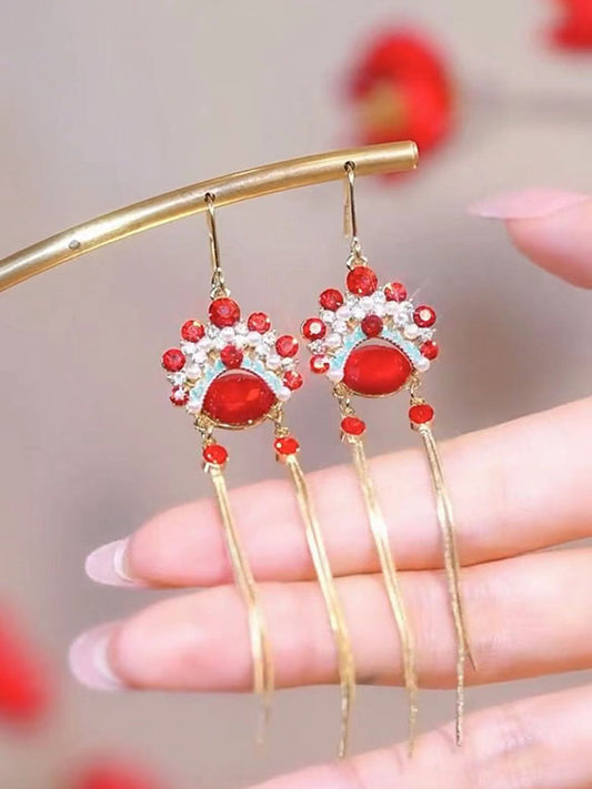 Pendientes largos elegantes con borlas