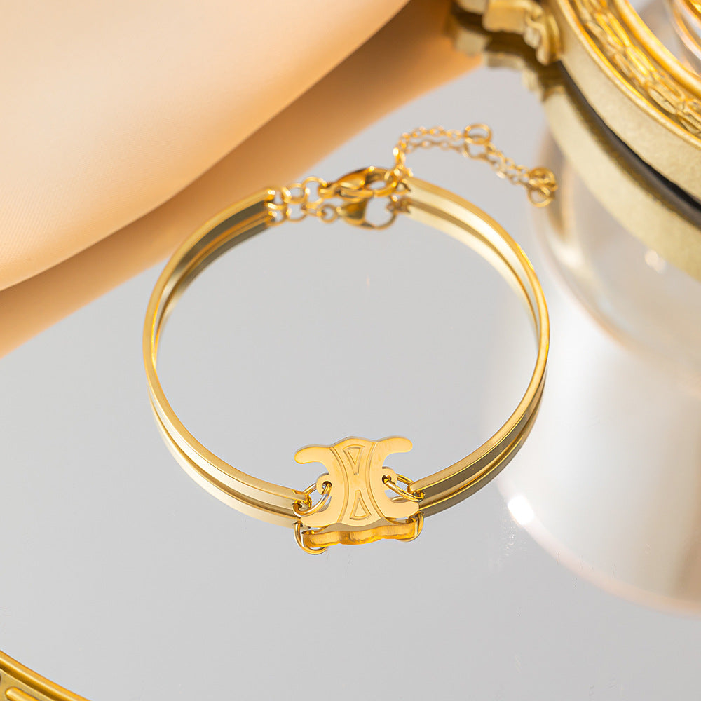 Pulsera de oro de alta gama con diseño de Arco del Triunfo para mujer