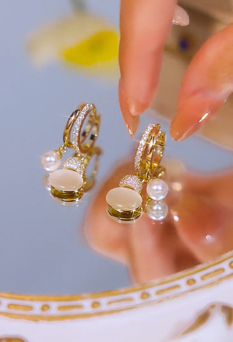 Pendientes de perlas de calabaza con ojo de gato para mujer