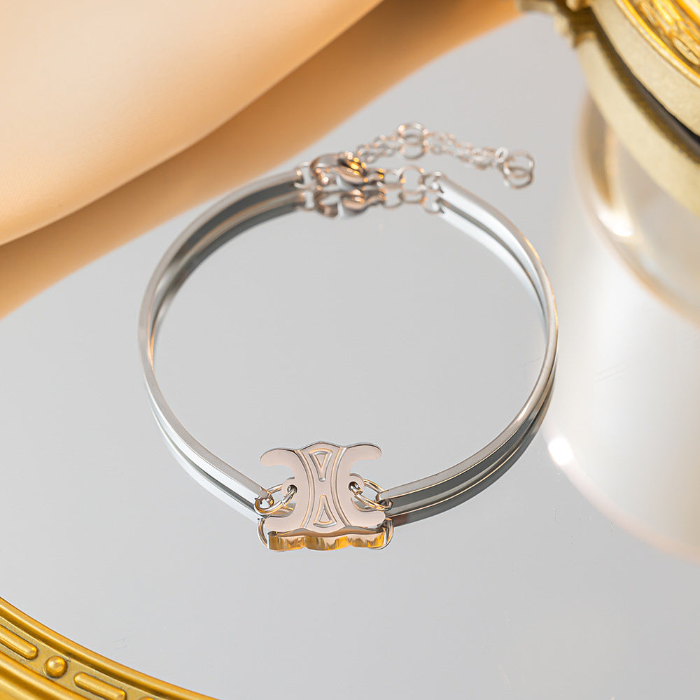 Pulsera de oro de alta gama con diseño de Arco del Triunfo para mujer