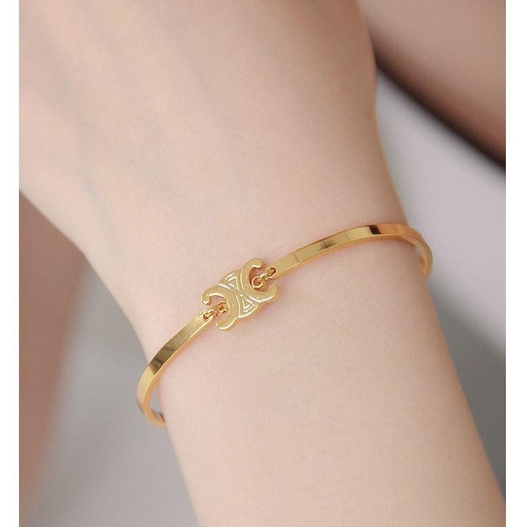 Pulsera de oro de alta gama con diseño de Arco del Triunfo para mujer