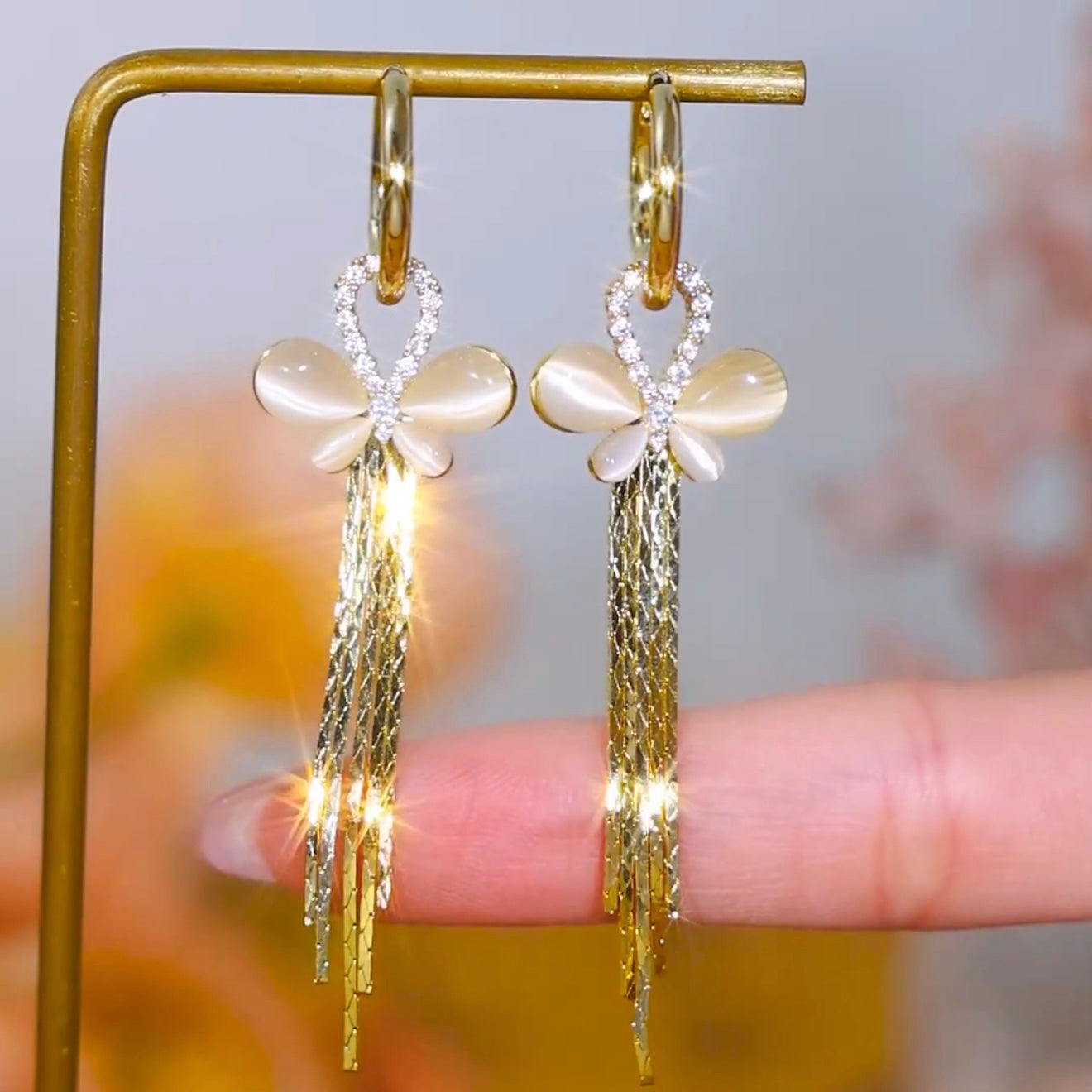 Design Simple Cat'S Eye Butterfly Tassel Long Earrings