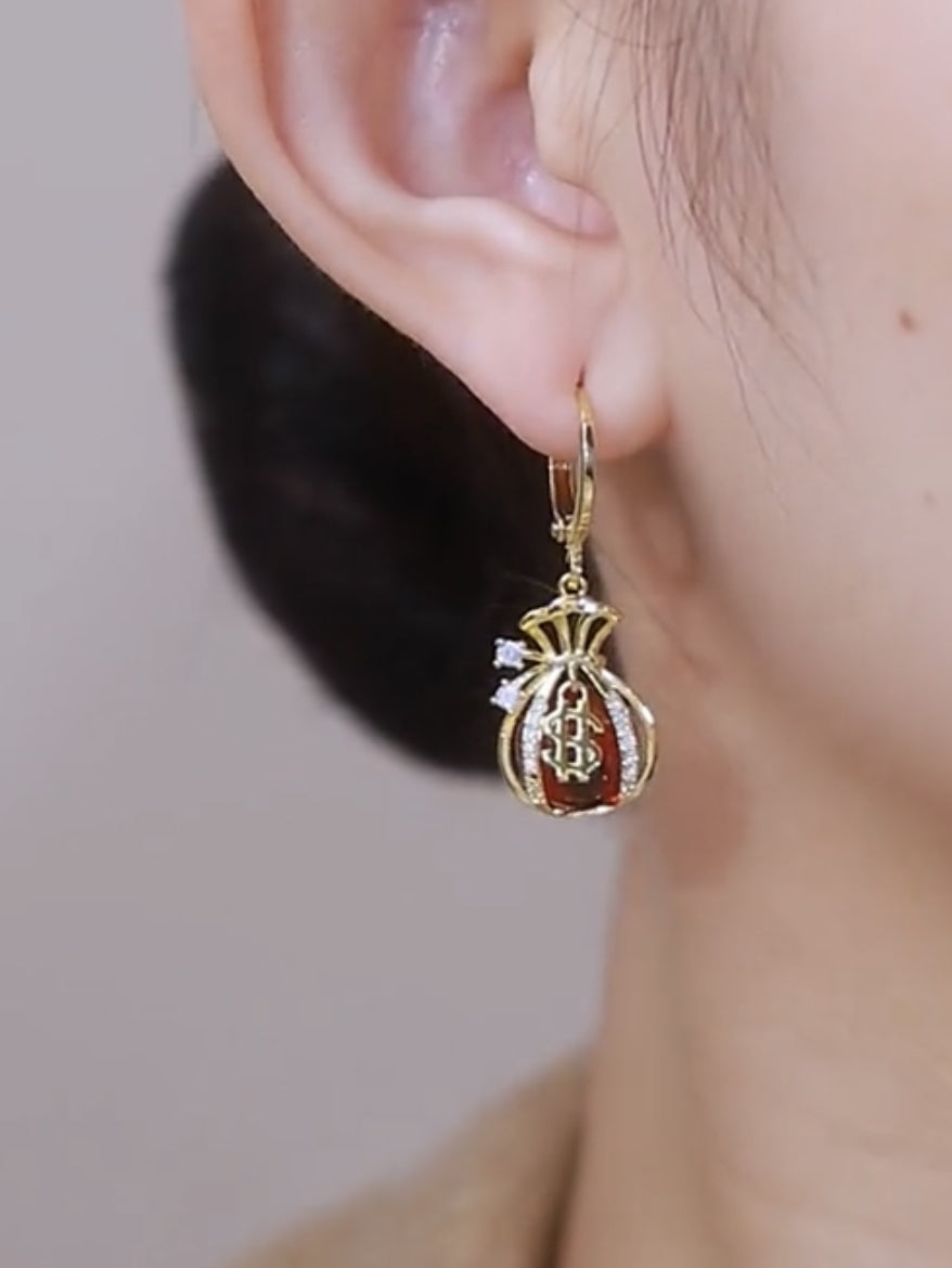 Nuevos pendientes de bolsa de dinero con forma de ojo de gato Pendientes con personalidad para mujer