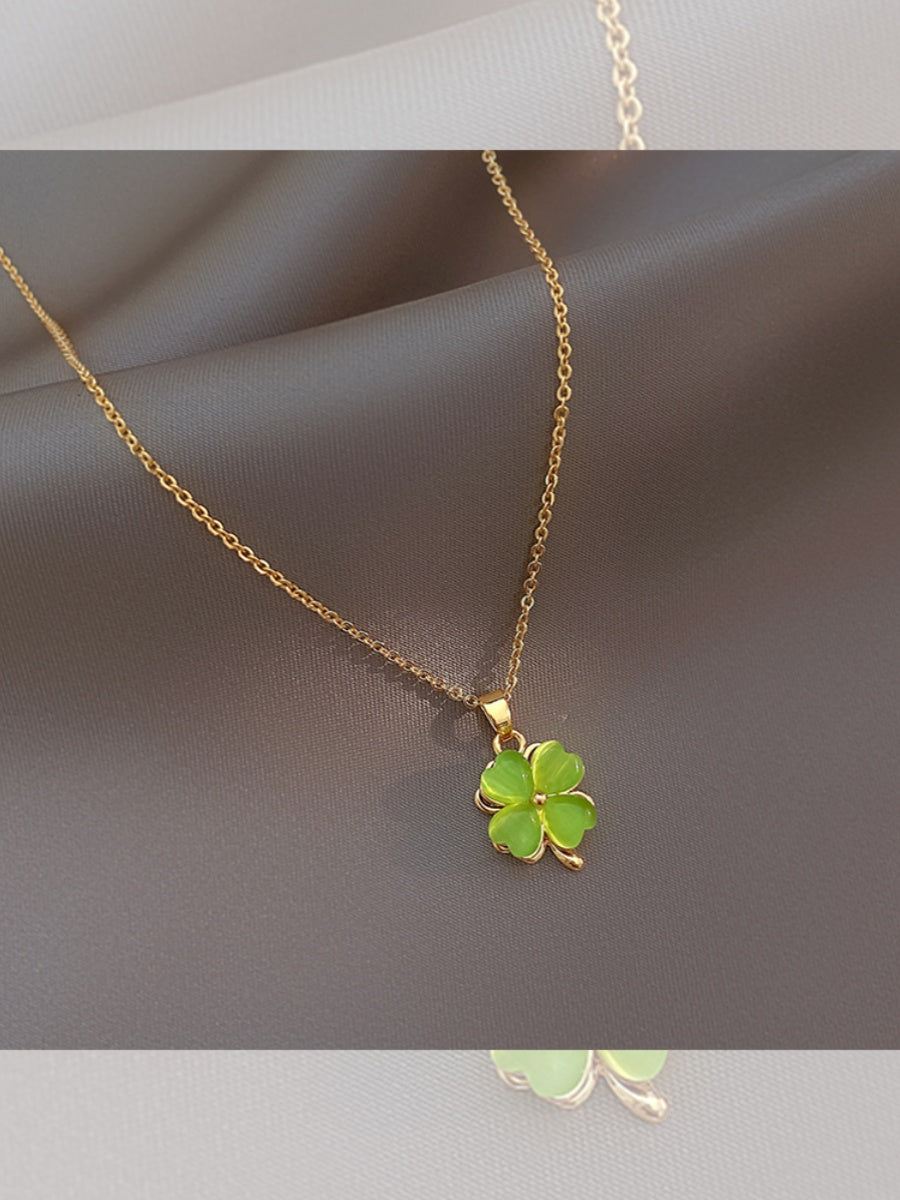 Collar con colgante de cadena de clavícula para mujer con trébol de cuatro hojas y ojo de gato de la suerte